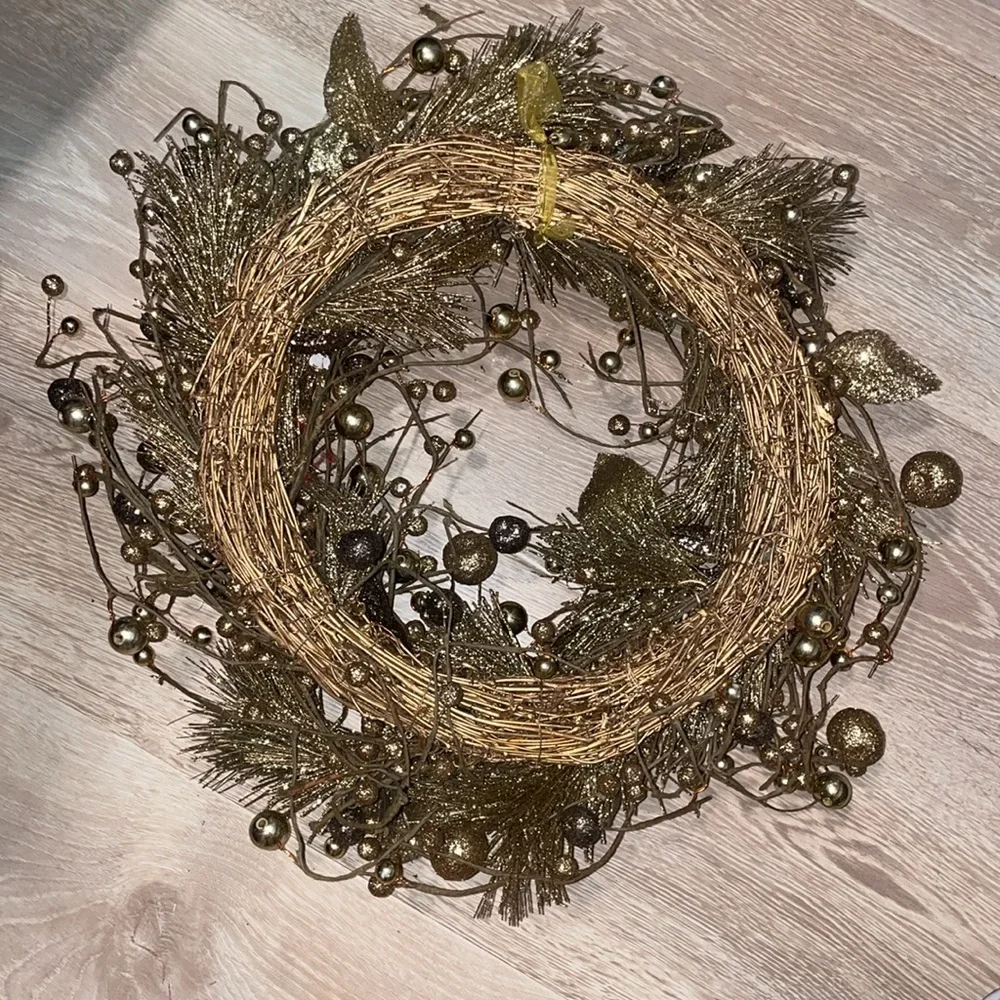 Golden decorative handing wreath